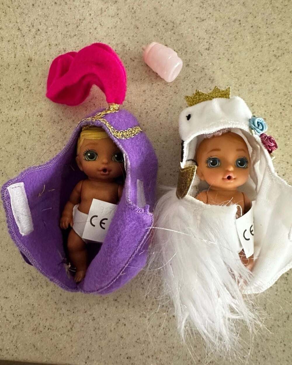 Set of 2 Zapf Creation Baby Born Surprise Mini Dolls, (Purple and White Swans)